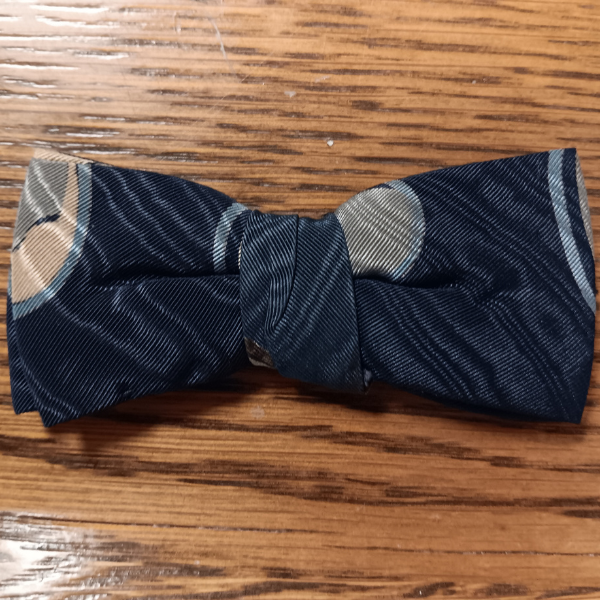 A patterned blue bow tie, said to have been worn by Abraham Lincoln the night of his death.